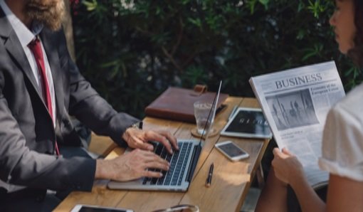 dude at a laptop with some chick